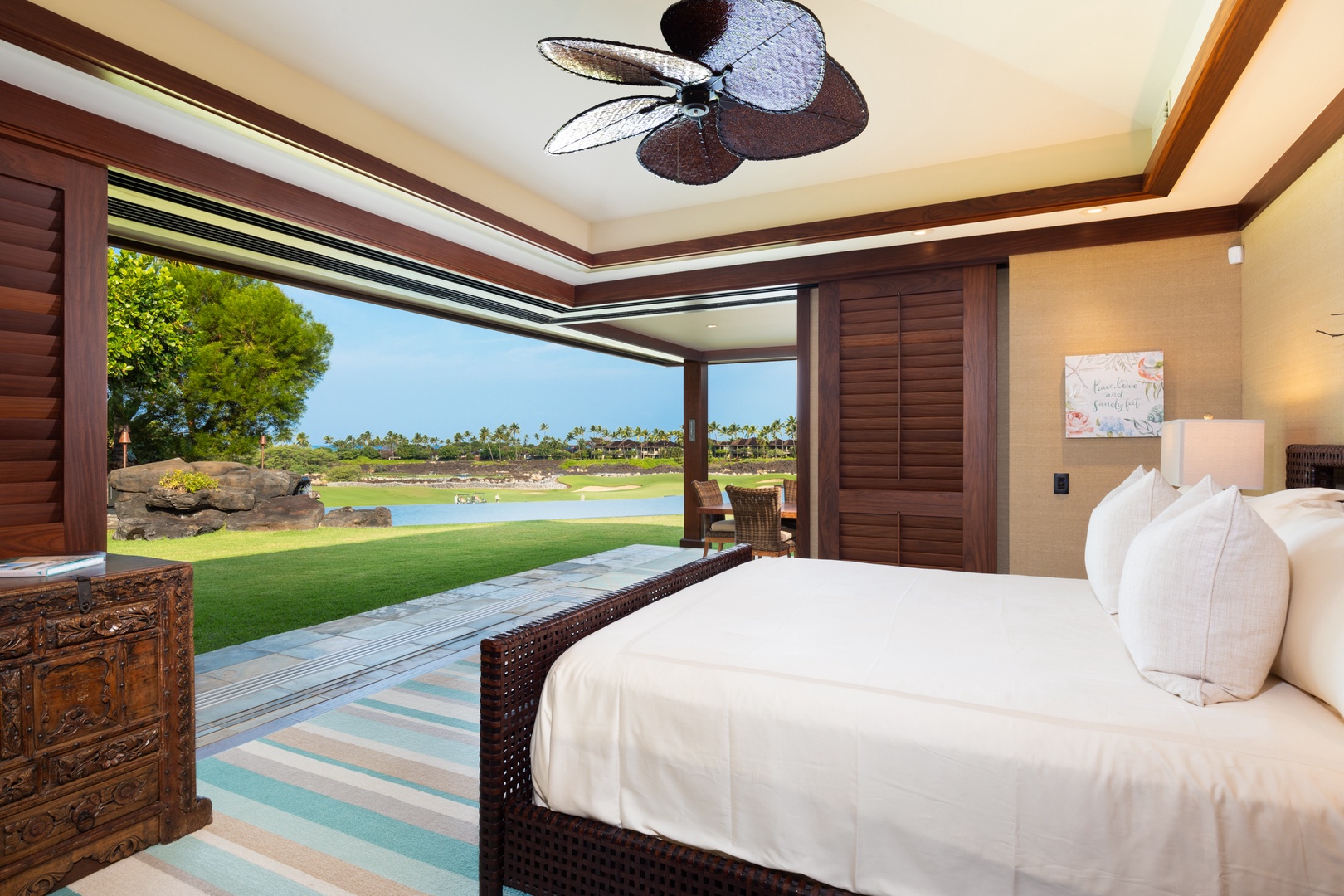 Kailua Kona Vacation Rentals, 5BD Ke Alaula Estate (144) at Hualalai Resort - Guest suite with Cal king bed and opens to the lanai with sweeping ocean and fairway views.