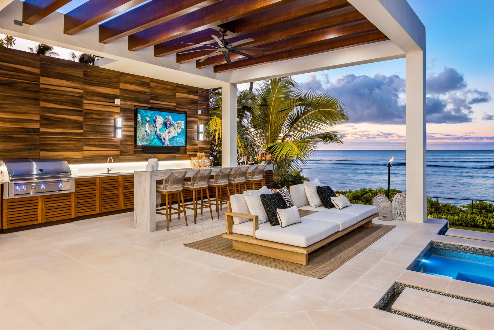Honolulu Vacation Rentals, Diamond Head Grand Escape - Host unforgettable evenings with outdoor dining, lounge seating, and a full bar setup overlooking the water.