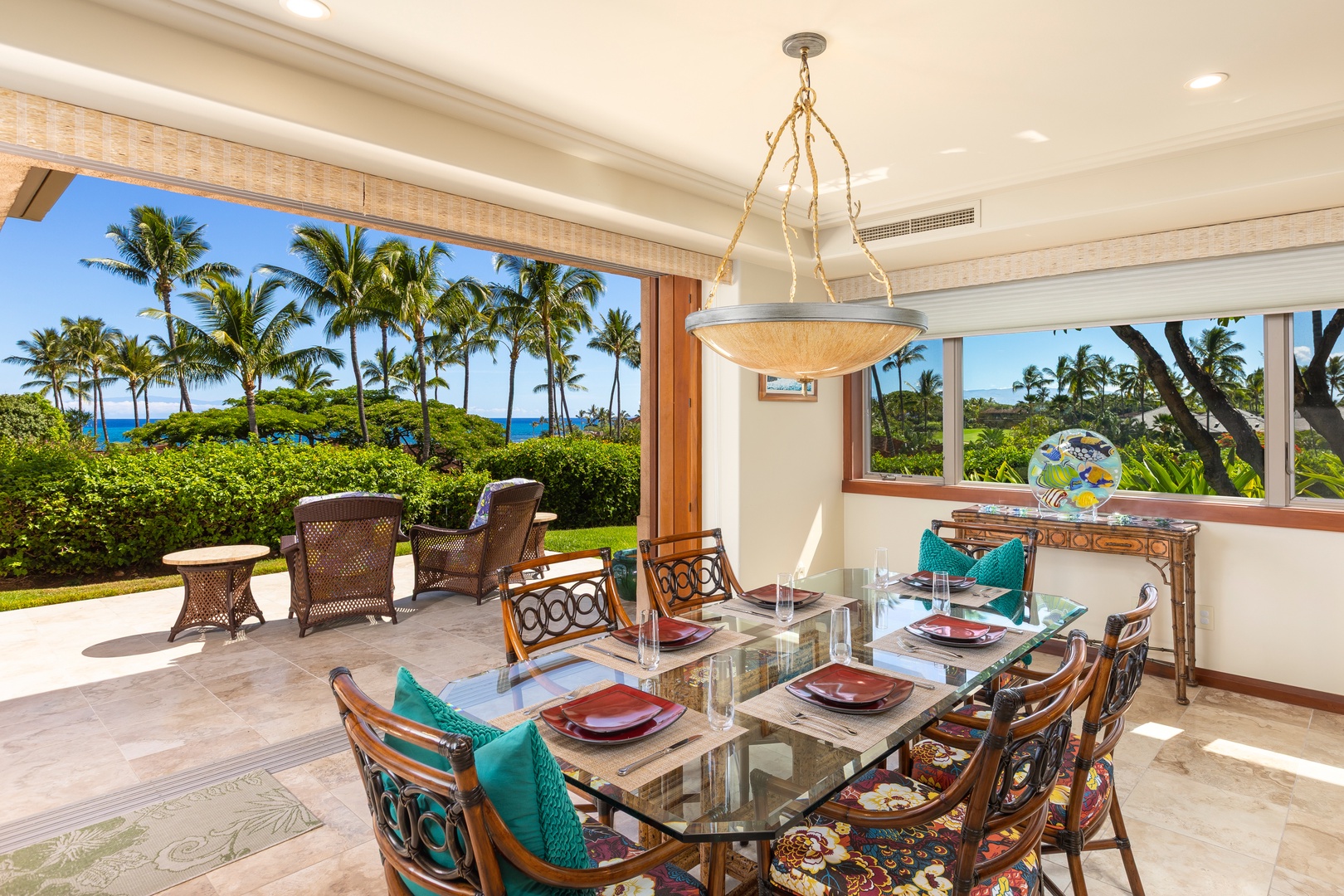 Kailua Kona Vacation Rentals, 2BD Hillside Villa (4102) at Hualalai Resort - Indoor dining nook framed by sweeping views of palms and sky.