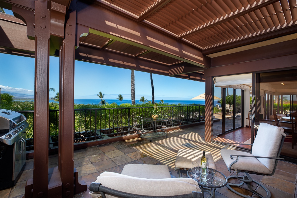 Kamuela Vacation Rentals, Mauna Kea Villas #13 - Enjoy the second primary suite’s private lanai with cozy seating and endless ocean vistas.