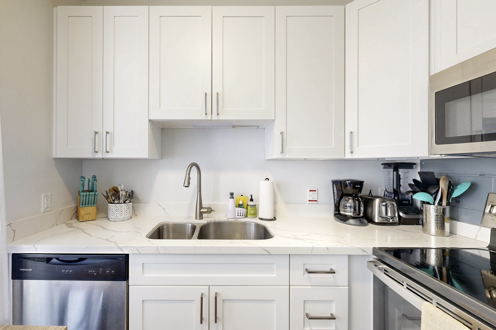 Kahuku Vacation Rentals, Kuilima Estates West #132 - Full kitchen with modern appliances and essentials.