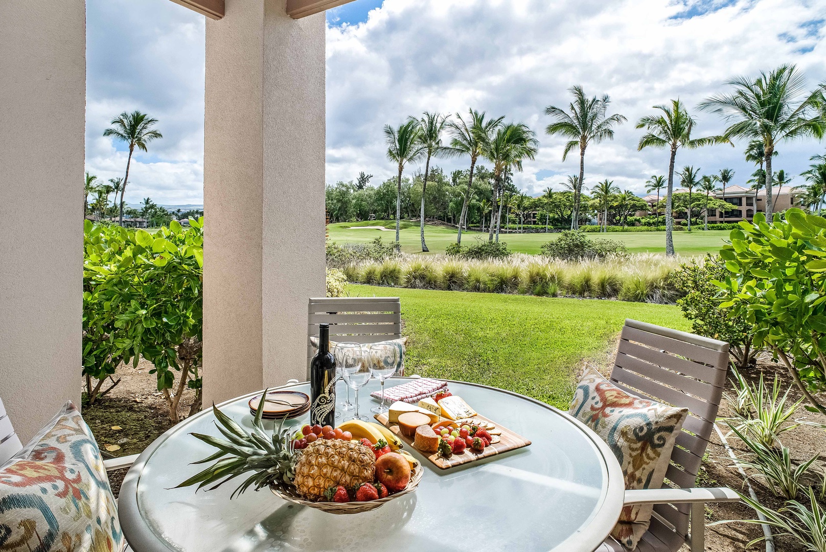 Waikoloa Vacation Rentals, Waikoloa Colony Villas 403 - Additional Dining in Private Patio Outside Dining Room w/ View of Golf Course and Palm Trees