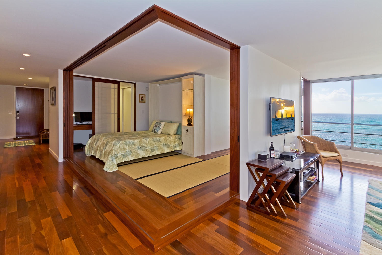 Honolulu Vacation Rentals, Executive Gold Coast Oceanfront Suite - Guest bedroom with queen-size Murphy bed.