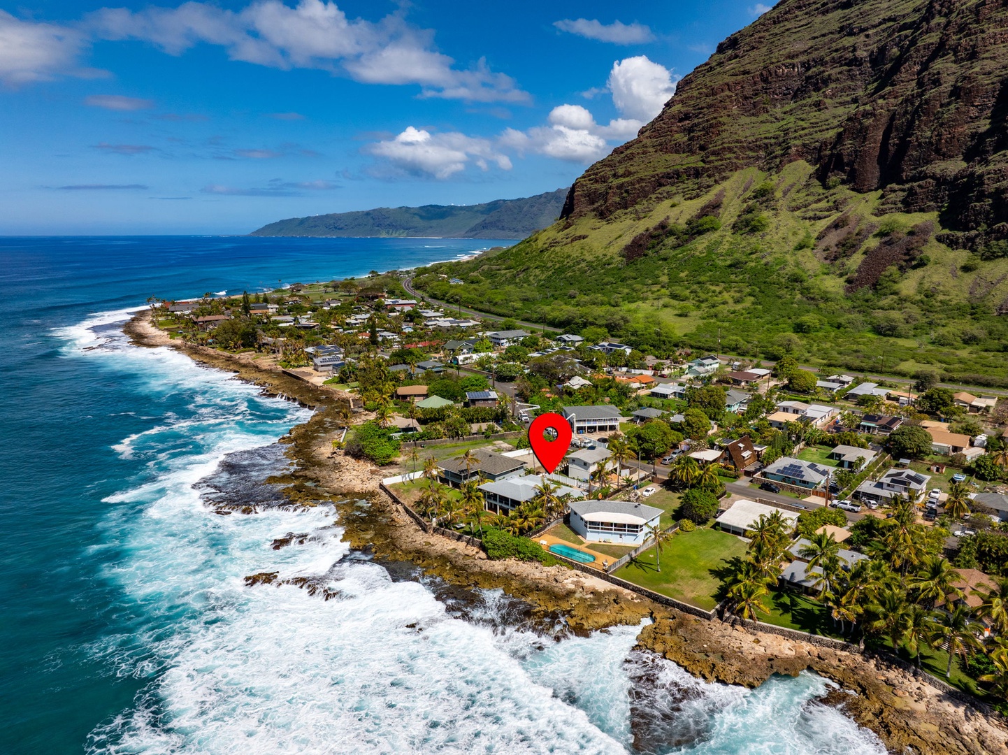 Waianae Vacation Rentals, Oceanfront Luxury Dream Estate - Bird’s-eye view shows the home’s exclusive oceanfront setting within a quiet, scenic neighborhood.