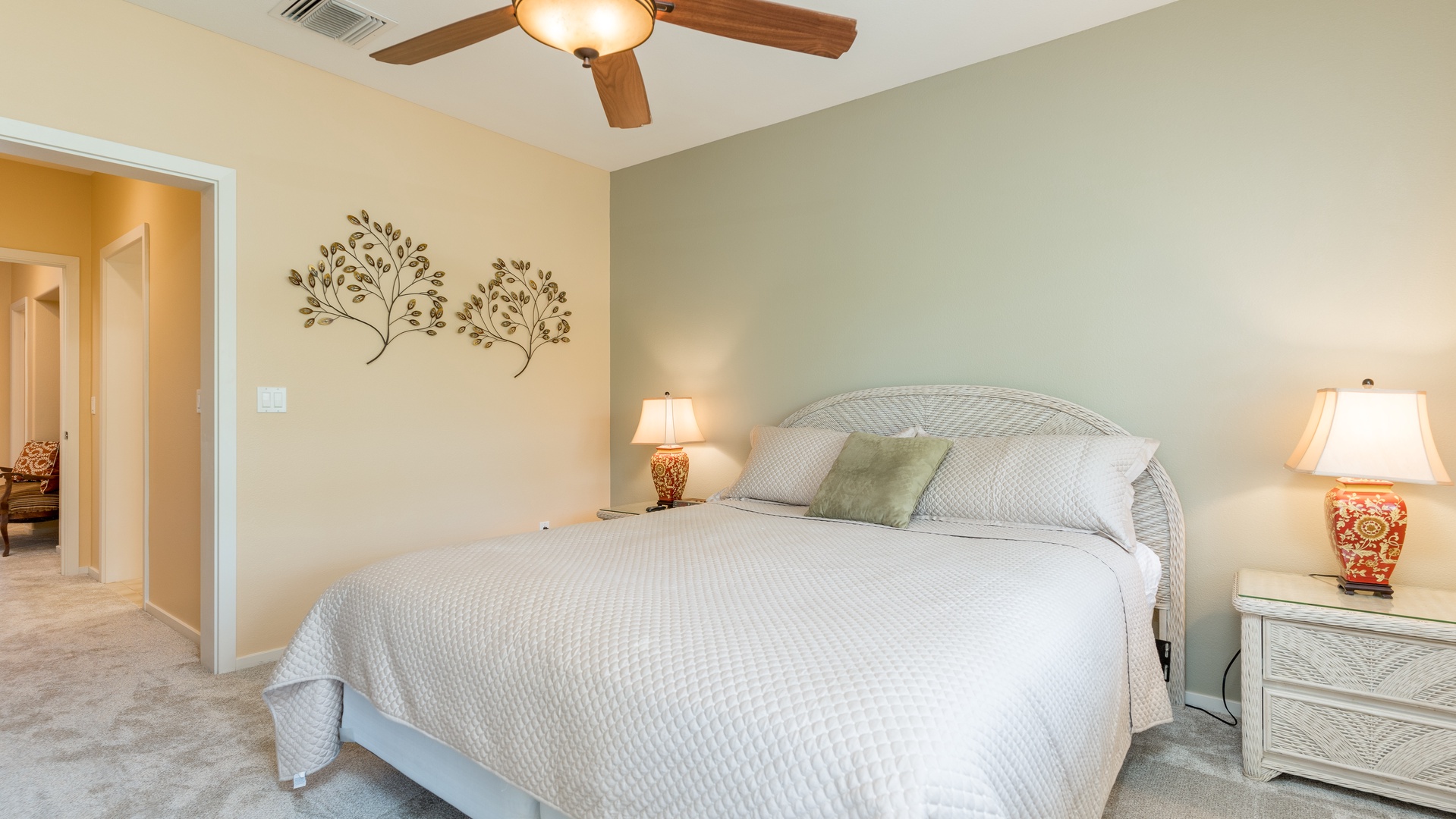 Kapolei Vacation Rentals, Coconut Plantation 1192-4 - The primary bedroom with a comfortable king bed and a dresser.