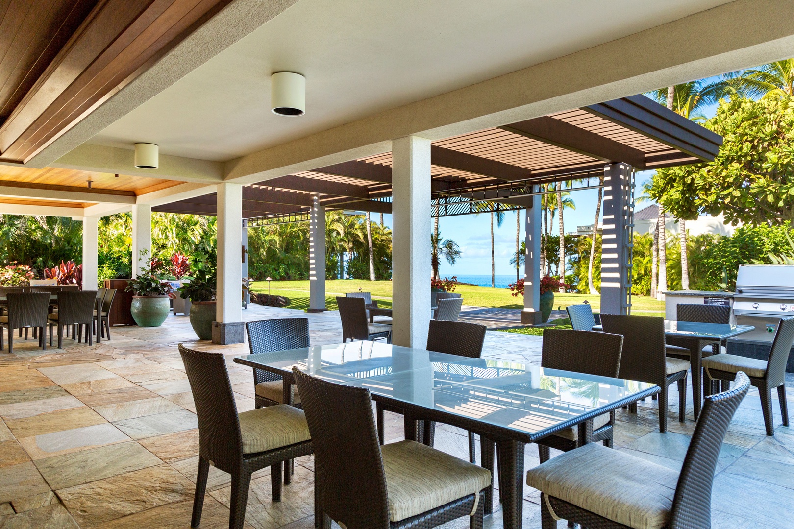 Kamuela Vacation Rentals, Mauna Lani Point E105 - Plenty of seating at the clubhouse and beautiful views.