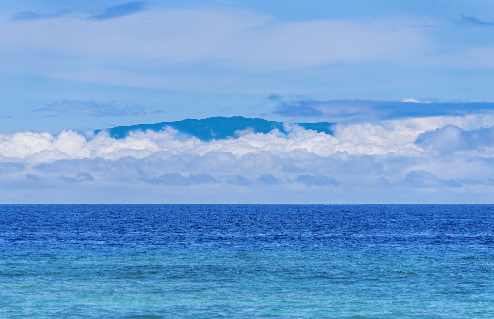 Kamuela Vacation Rentals, Island Time Retreat - View of Maui at the edge of the horizon.
