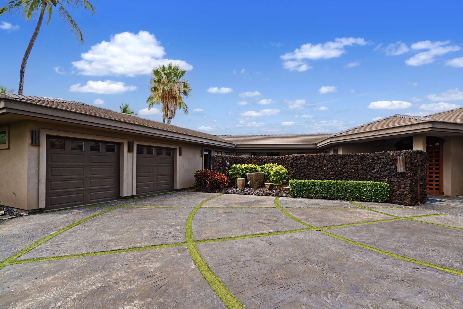 Kamuela Vacation Rentals, Hale Konane - Welcoming entry with a private driveway and tropical landscaping sets the tone for arrival.