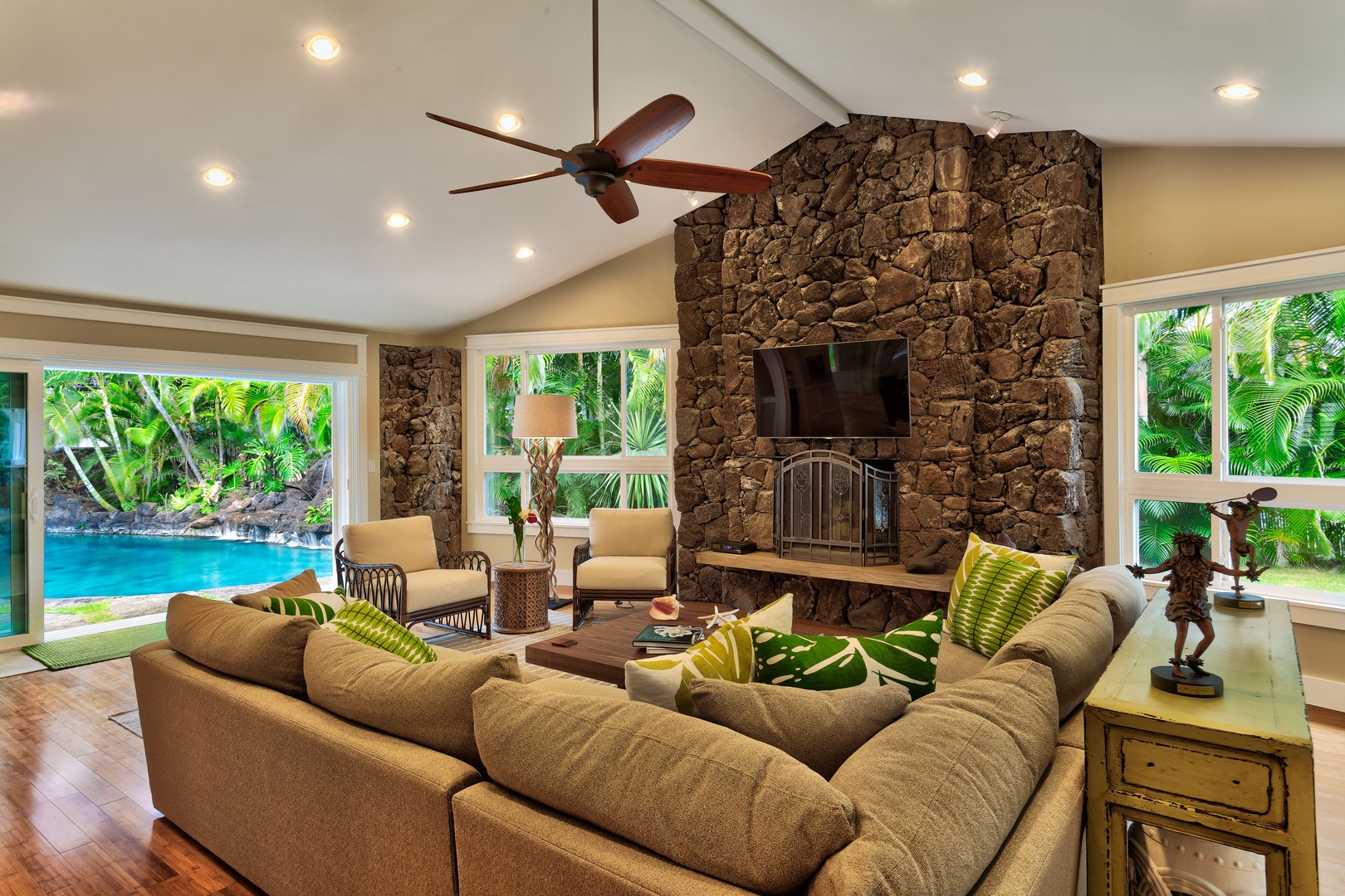 Kailua Vacation Rentals, Maluhia - Complete with vaulted ceilings, a stone fireplace, and elegant travertine and wood flooring, Maluhia’s expansive common areas and open flow provide a setting of relaxed luxury for your group’s vacation
