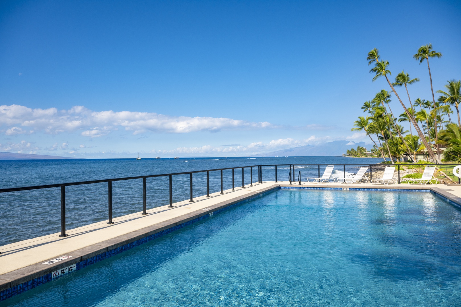 Lahaina Vacation Rentals, Puamana 240-3 - Take a refreshing dip while gazing out at the Pacific—an unforgettable view every time.