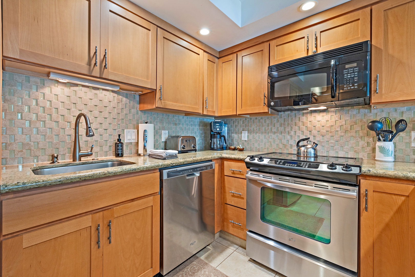 Lahaina Vacation Rentals, Kahana Sunset B4B - This modern kitchen is equipped with stainless steel appliances, sleek cabinetry, and everything you need to prepare meals during your stay.