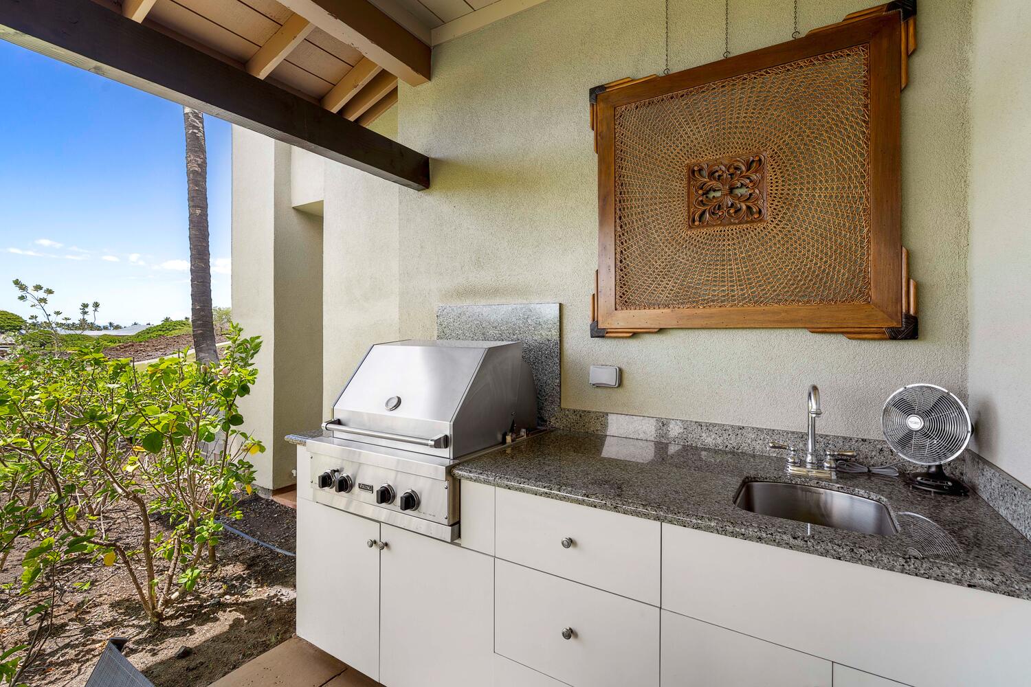 Kamuela Vacation Rentals, Mauna Lani Fairways #902 - BBQ feast in the outdoor kitchen.