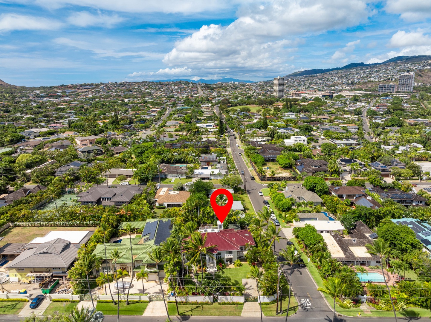 Honolulu Vacation Rentals, Kahala Oasis - Elevated view showing the villa’s location with scenic mountain and ocean views in the distance.