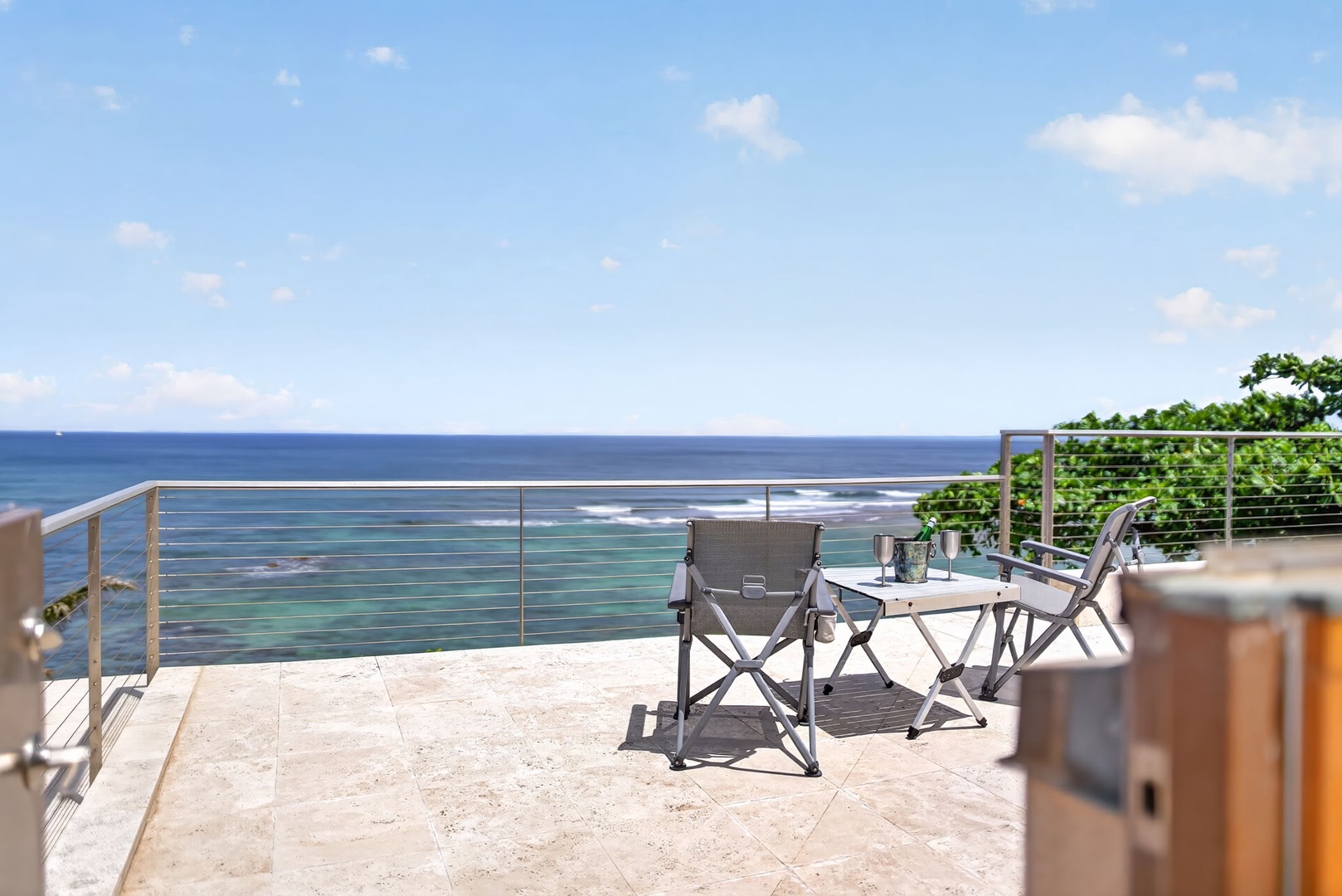Haleiwa Vacation Rentals, HaleGator - Enjoy morning coffee or evening cocktails from the expansive oceanfront terrace overlooking the Pacific.