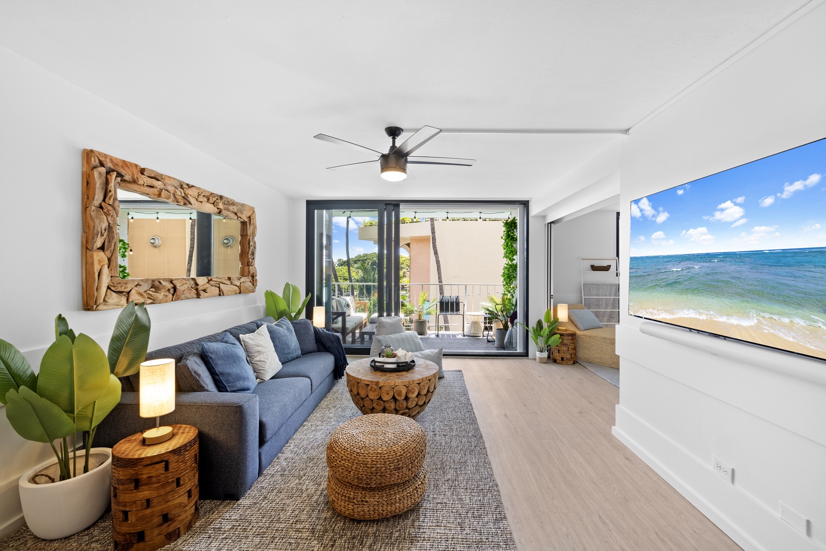 Honolulu Vacation Rentals, Hale Pono Waikiki - Welcoming living space featuring a spacious sofa, stylish seating, and lania views.