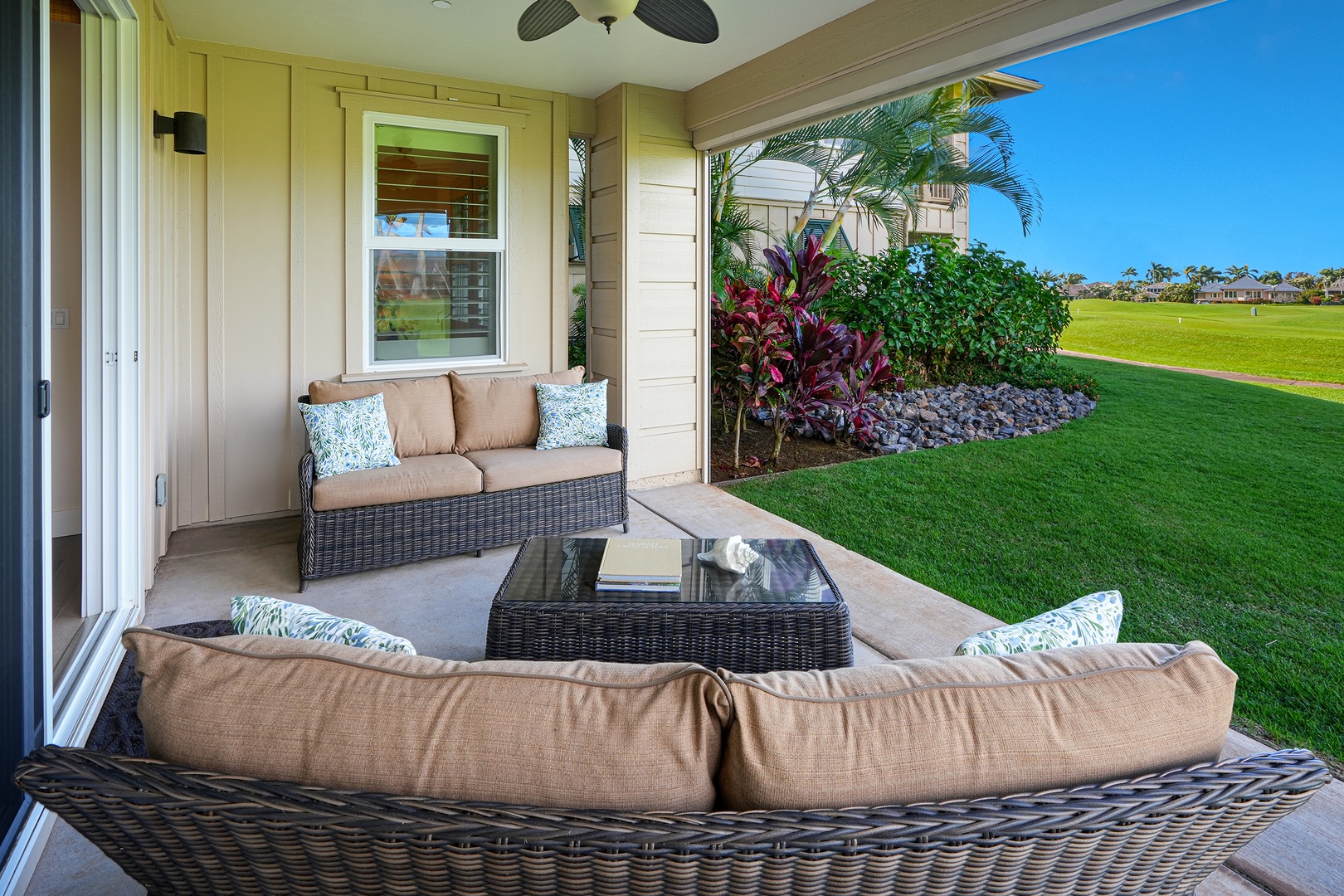 Koloa Vacation Rentals, Pili Mai 6J - Your private lanai features plush seating where you can unwind with tropical garden views stretching across manicured greens.