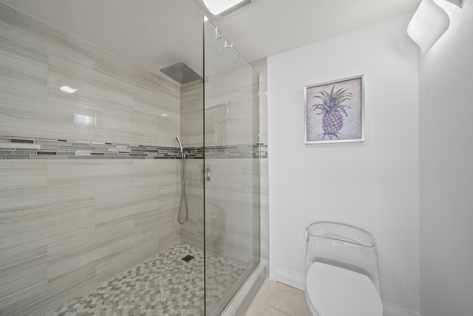 Honolulu Vacation Rentals, Aston Waikiki Beach Tower 602 - Refresh and recharge in a pristine walk-in shower in the ensuite main bath, perfect after a day in the sun.