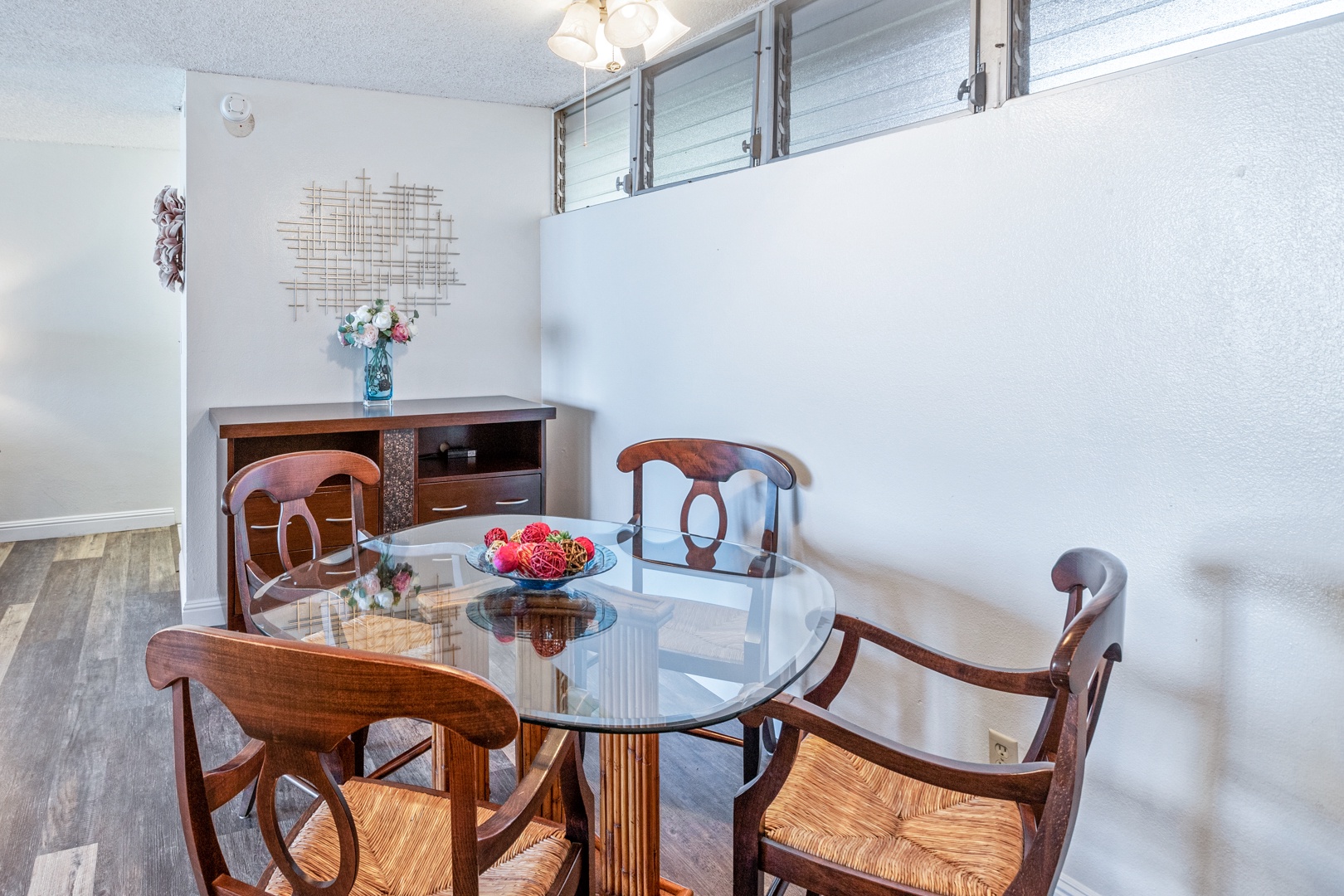 Lahaina Vacation Rentals, Royal Kahana 308 - The dining area offers a cozy space with a glass-top table and seating for four.