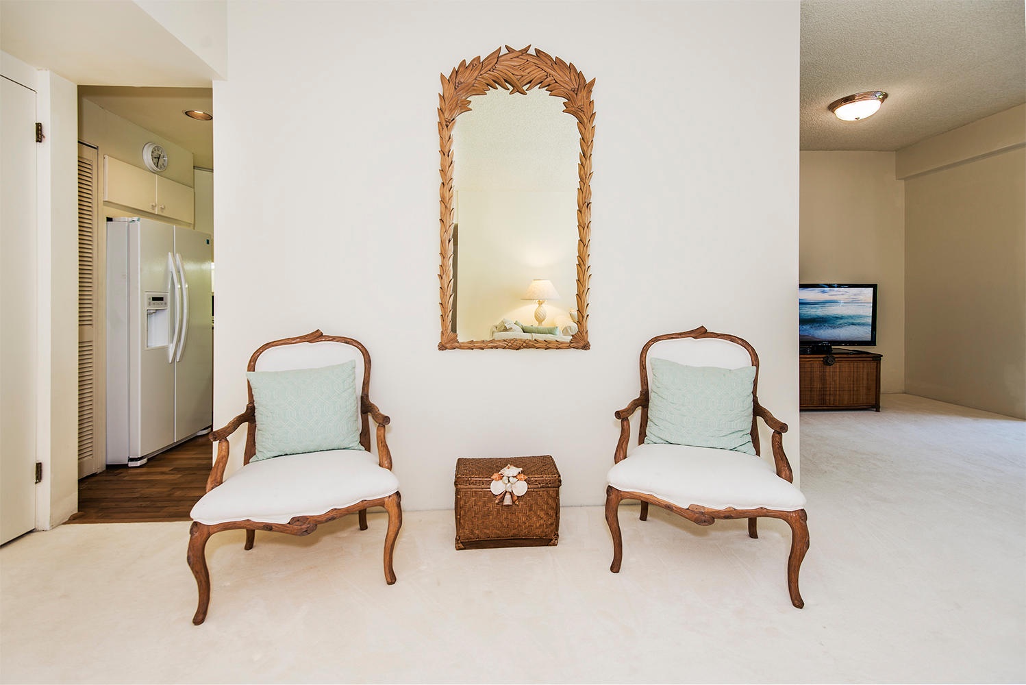 Honolulu Vacation Rentals, Kahala Beachfront Villa - Enjoy a cozy conversation in the seating area.