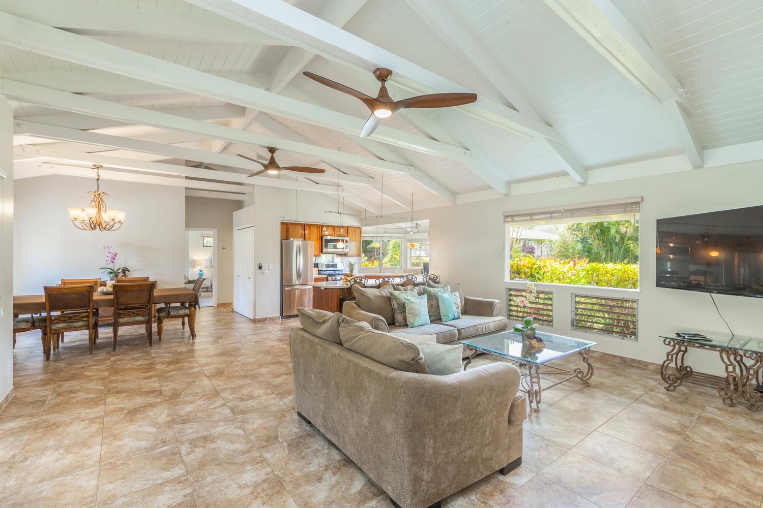 Princeville Vacation Rentals, Mala Hale - Mala Hale has an open concept layout with vaulted ceilings, ceiling fans and a living area that flows into the dining room