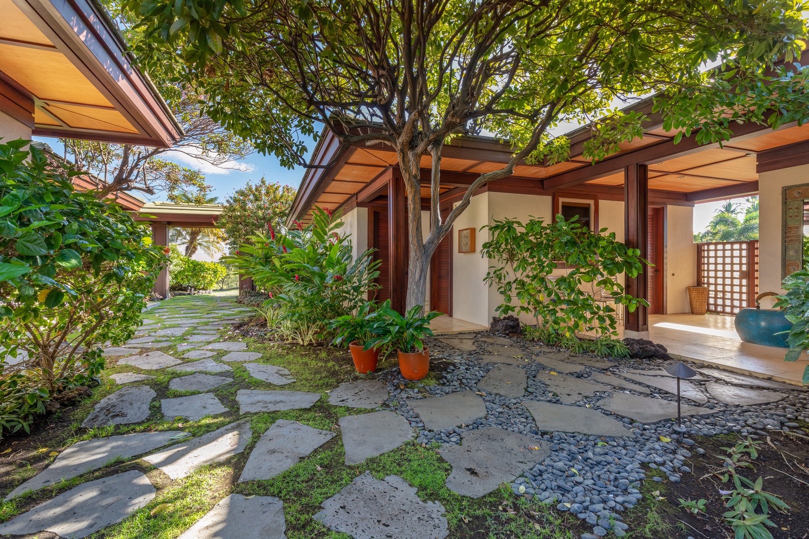 Kamuela Vacation Rentals, Champion Ridge Home - Lush entry courtyard welcomes you to your Hawaiian retreat.