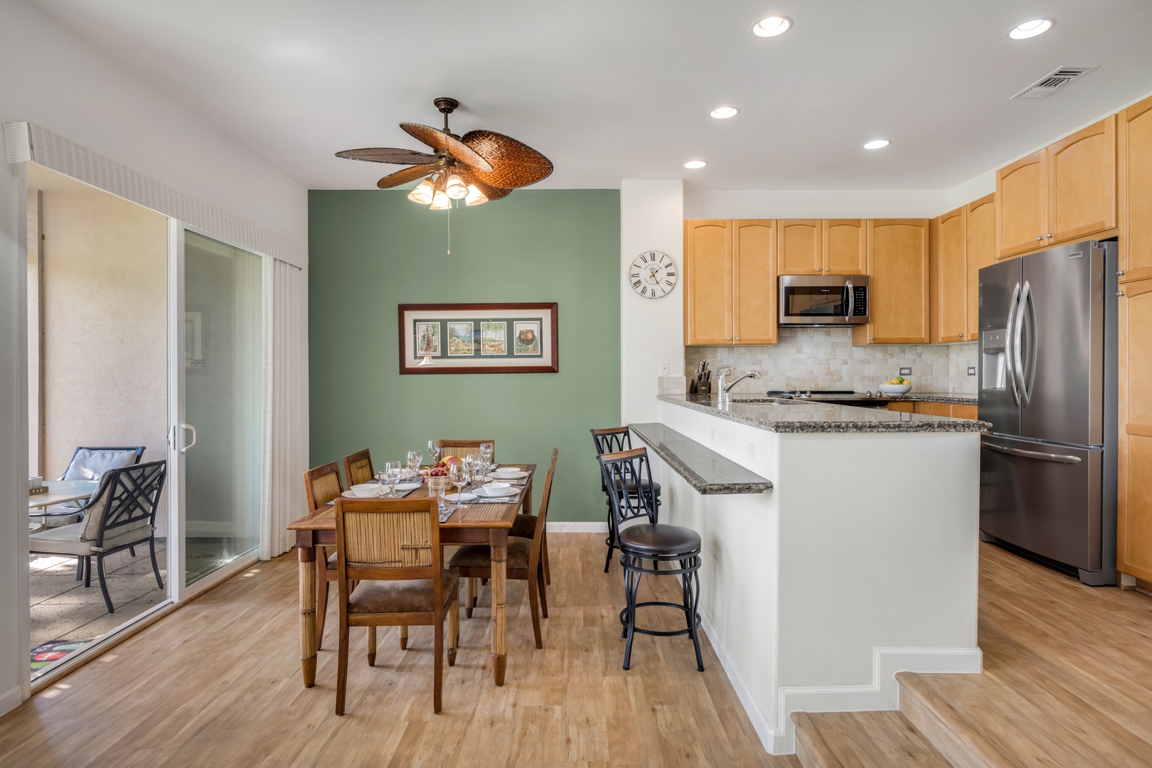 Waikoloa Vacation Rentals, Waikoloa Colony Villas 403 - This fully equipped kitchen with granite countertops opens to the dining area, offering form, function, and flow.