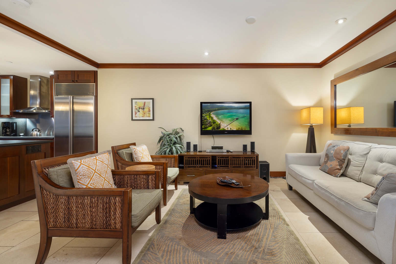 Kapolei Vacation Rentals, Ko Olina Beach Villas O1006 - The living room area with comfortable seating and TV.
