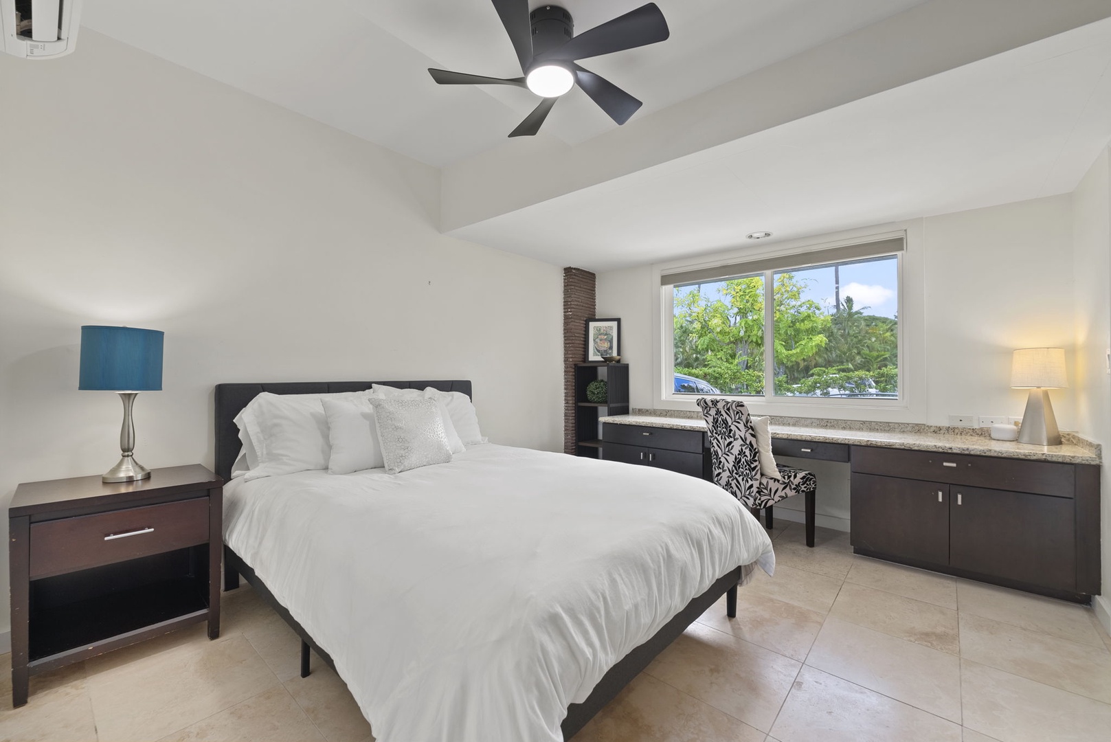 Honolulu Vacation Rentals, Kahala Lani - Guest bedroom with queen bed and ceiling fan for cool, cozy comfort.