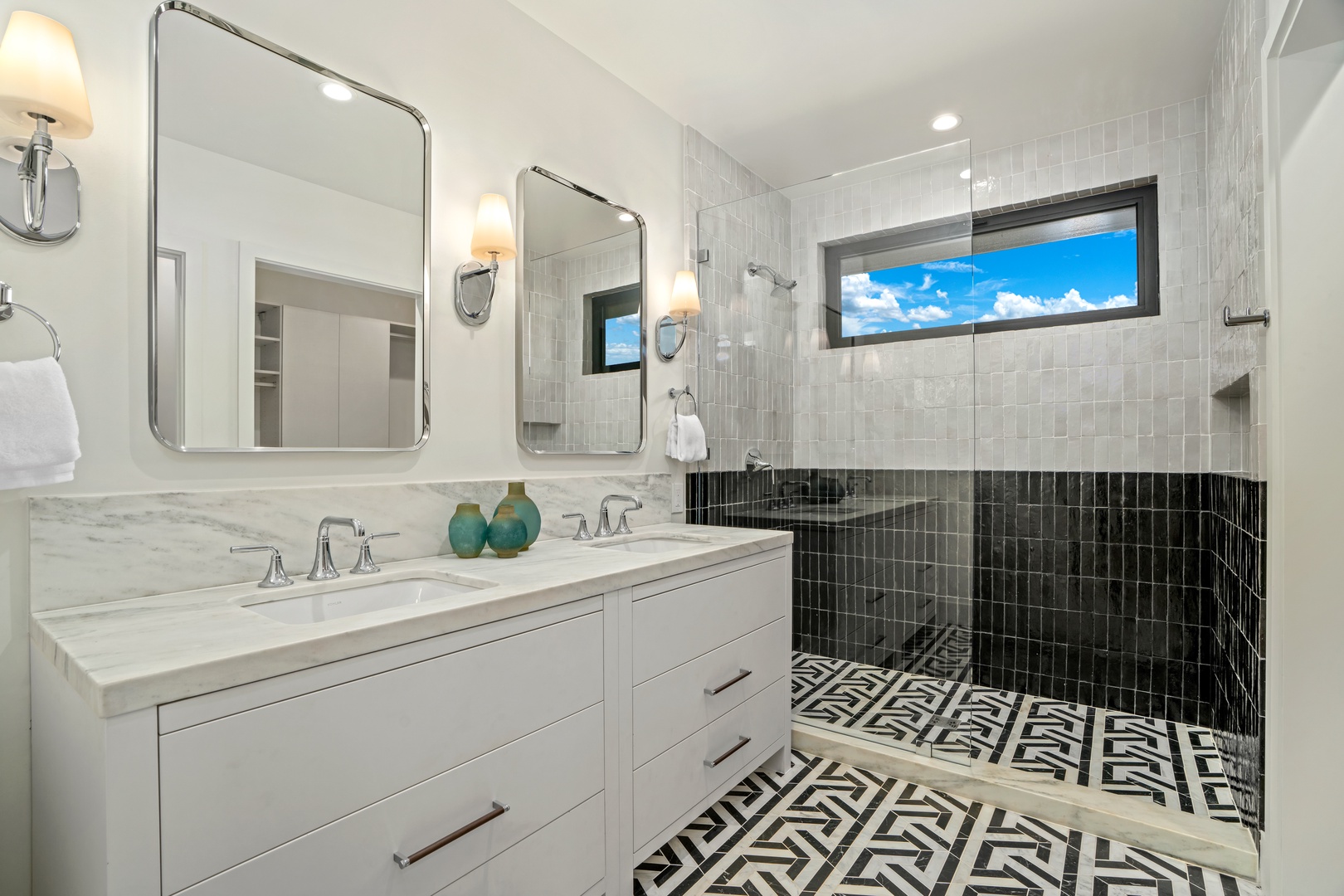 Koloa Vacation Rentals, Hale Laule'a at Kukui'ula - Indulge in your stylish ensuite with double vanities, quartz counters, and a stunning glass-enclosed shower featuring geometric tile details.
