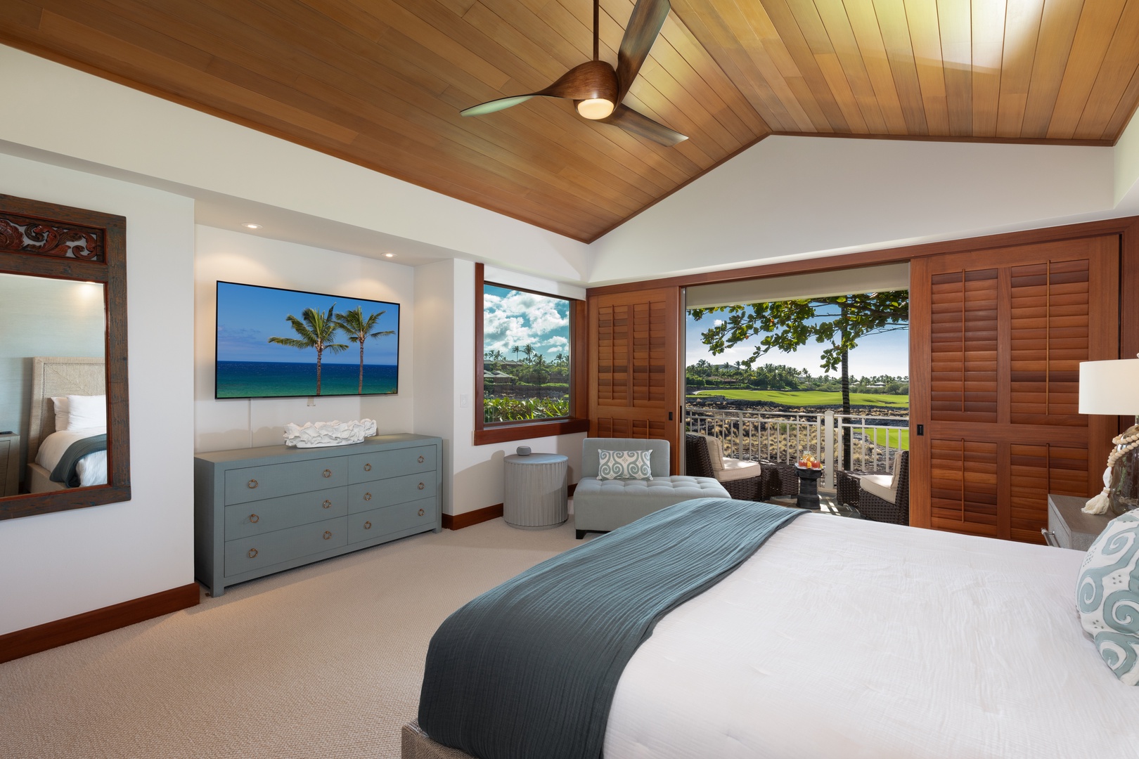 Kailua Kona Vacation Rentals, 3BD Waiulu Villa 111D at Hualalai Resort - Spacious primary bedroom with a king-size bed, tropical views, and natural wood accents.