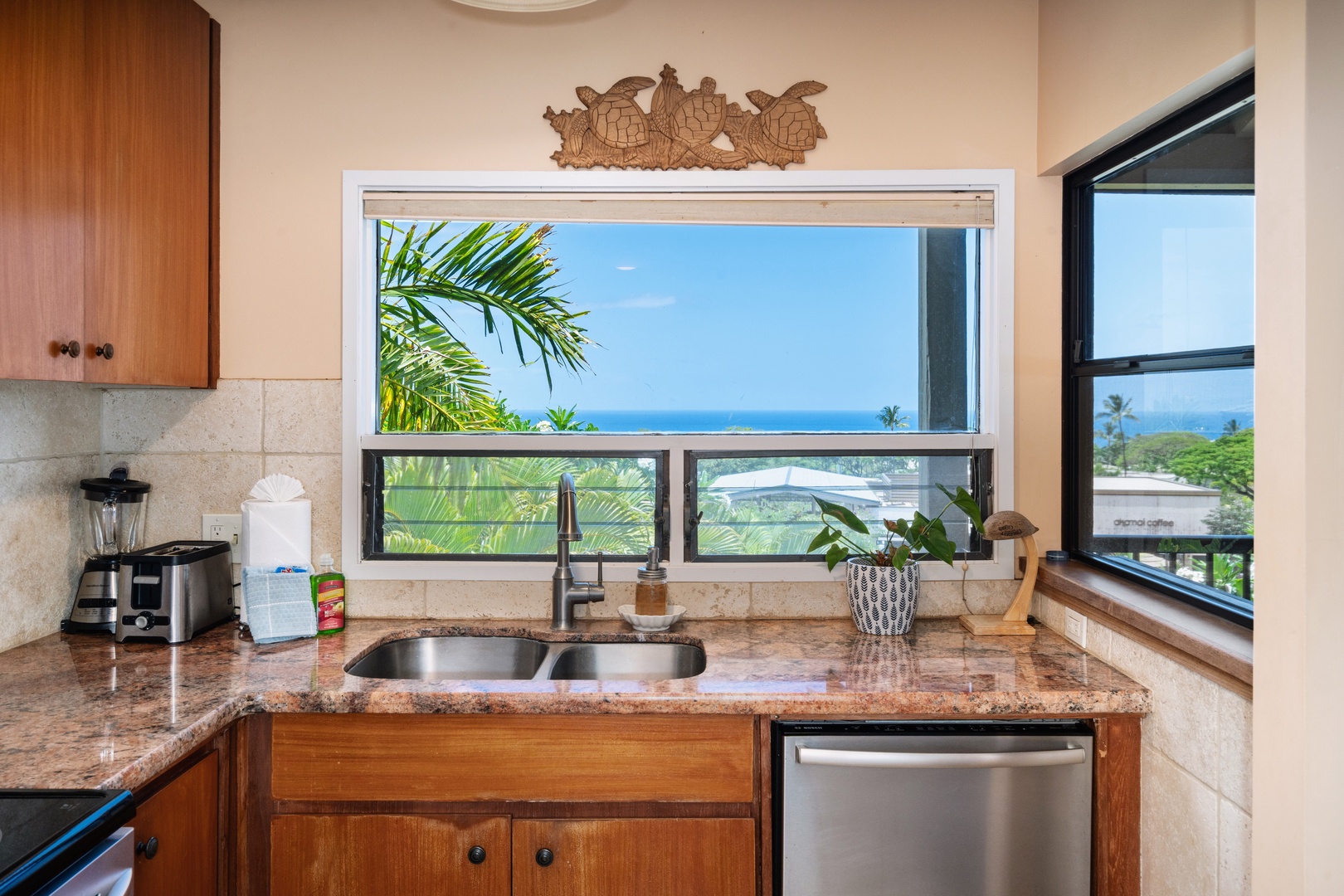 Kihei Vacation Rentals, Wailea Ekolu 204 - Clean up quickly with a view that looks straight out at the palms and the water beyond.