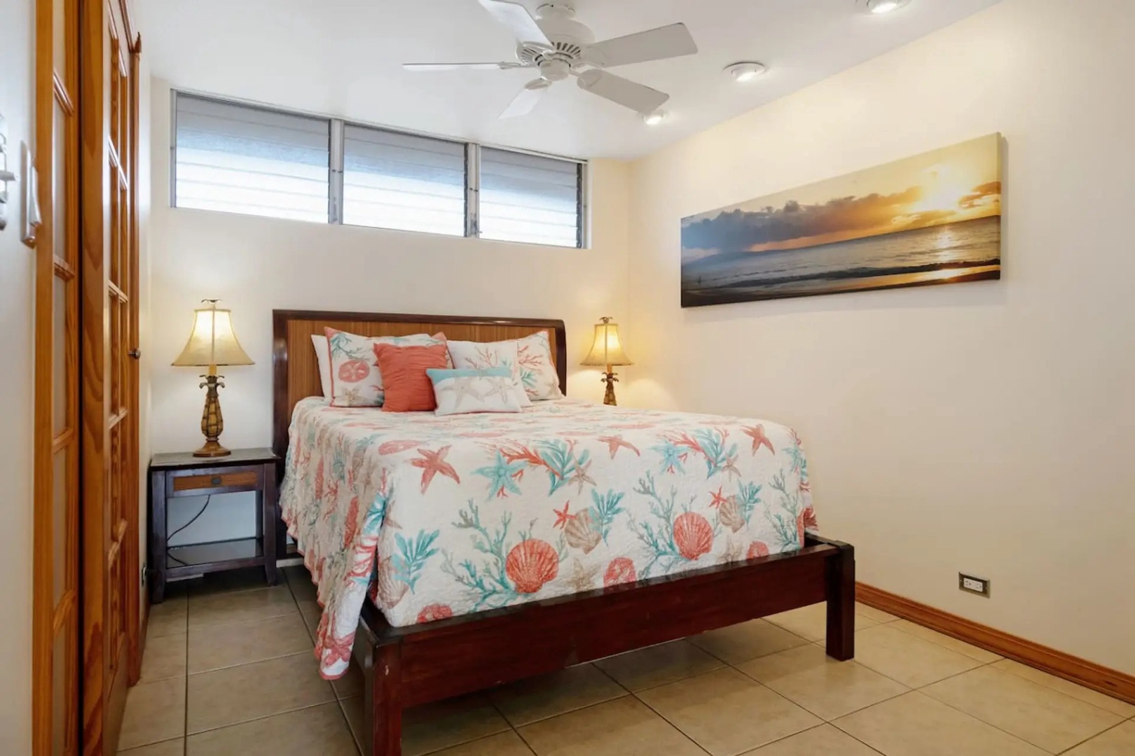 Kihei Vacation Rentals, Kalama Terrace P302 - By evening this is the room that pulls you in early, lamps warm and the fan on low.