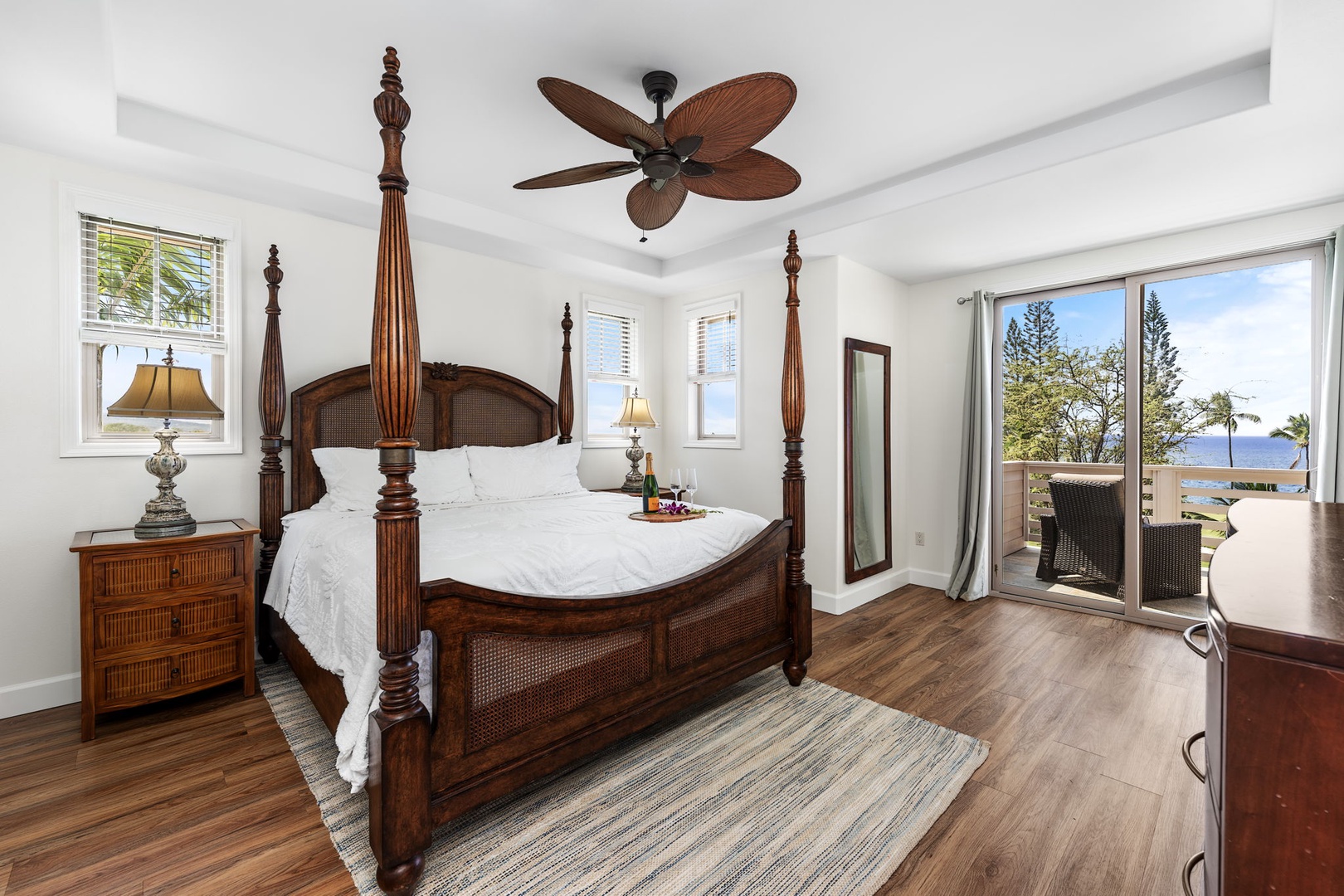 Kailua Kona Vacation Rentals, Holua Moana Hale - Primary bedroom with a regal king bed and elegant furnishings.