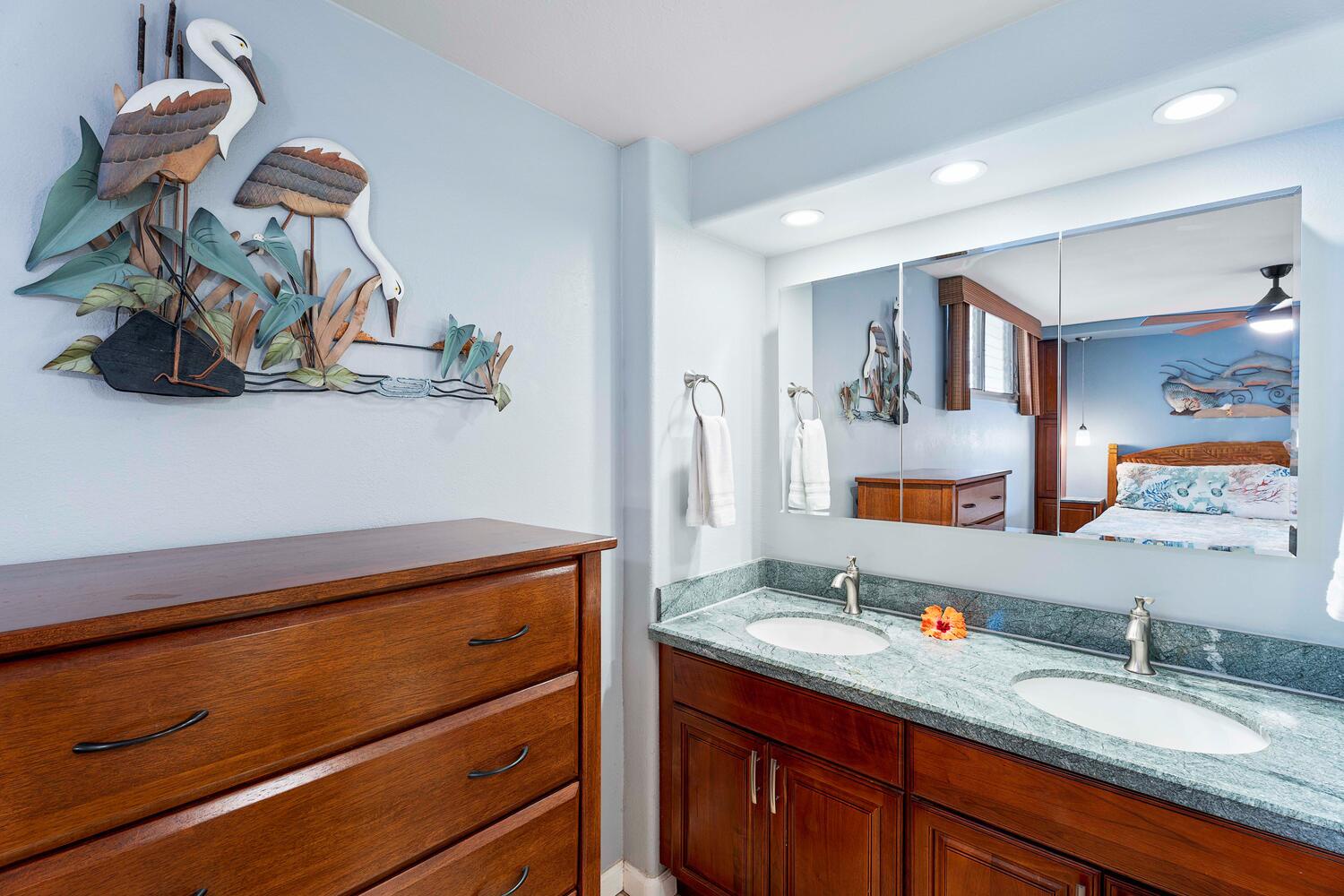 Kailua Kona Vacation Rentals, Kona Alii 403 - The ensuite bathroom has dual vanities and a walk-in shower.