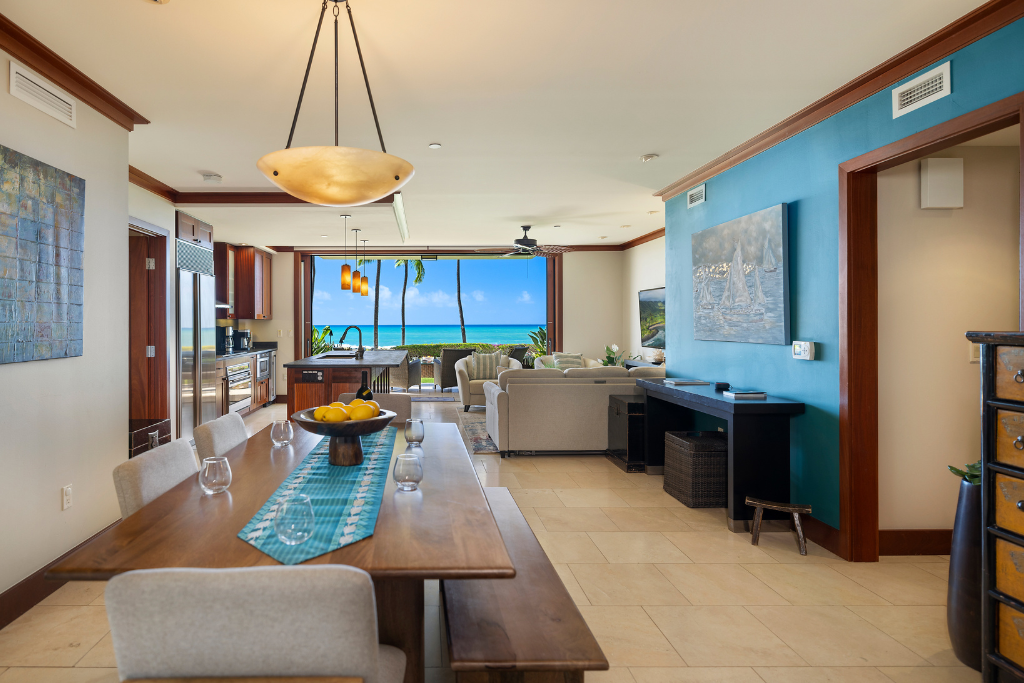 Kapolei Vacation Rentals, Ko Olina Beach Villas B109 - Elegant open-plan layout featuring a spacious dining area and a comfortable living space, with sweeping ocean views.