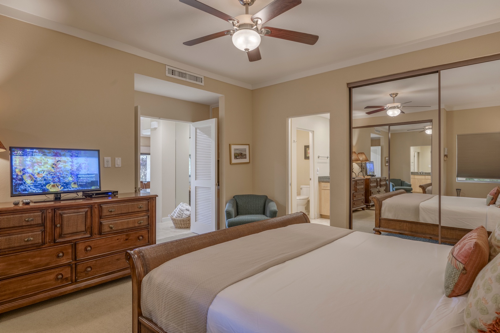 Lahaina Vacation Rentals, Kapalua Golf Villas 14P1-2 - Primary bedroom with king bed and tropical-themed décor creates a cozy, restful retreat.