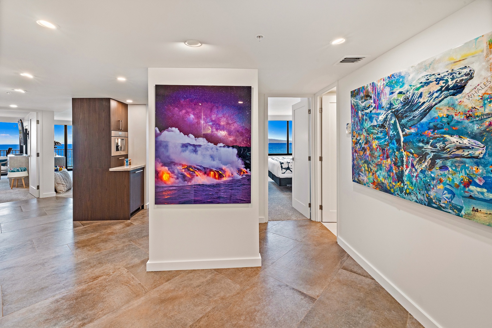 Lahaina Vacation Rentals, Kaanapali Shores 702 - Bright and colorful artwork in the hallway leads to the bedrooms, adding a unique touch to the modern interior design.Bright and colorful artwork in the hallway leads to the bedrooms, adding a unique touch to the modern interior design.