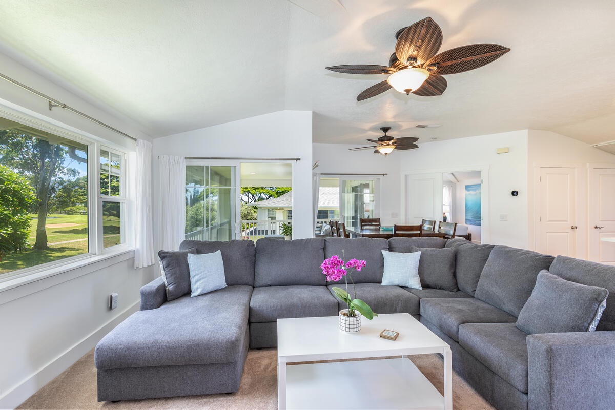 Princeville Vacation Rentals, Pili Aloha - Bright living room with sectional sofa and plenty of space to relax.