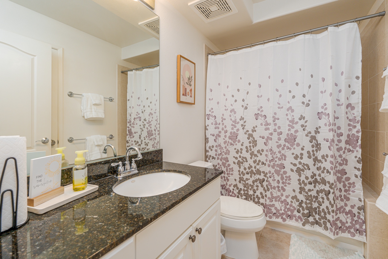 Kapolei Vacation Rentals, Ko Olina Kai 1105F - The ensuite bathroom with a single sink and a walk-in shower.