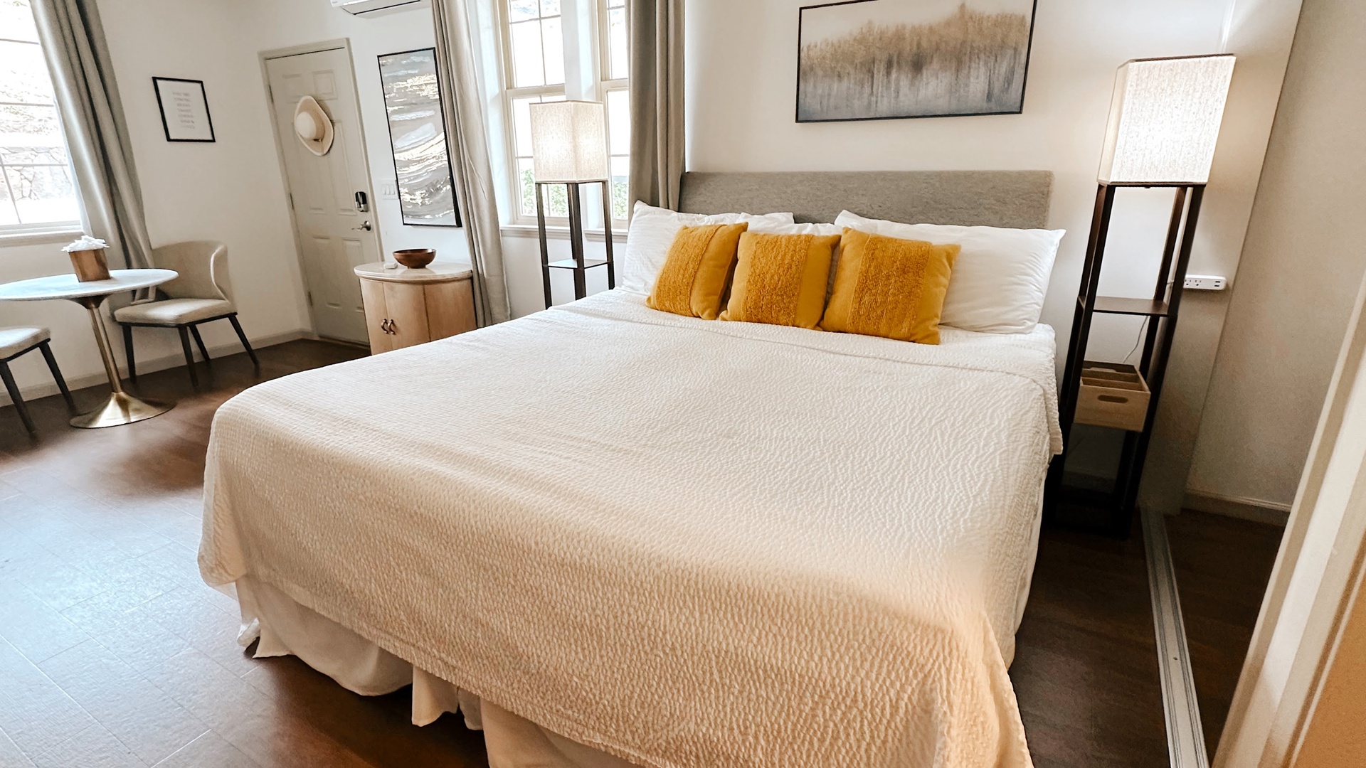 Makaha Valley Vacation Rentals, Makaha Valley Hale Kai** - Cozy bedroom with warm accents, a welcoming space for restful nights.