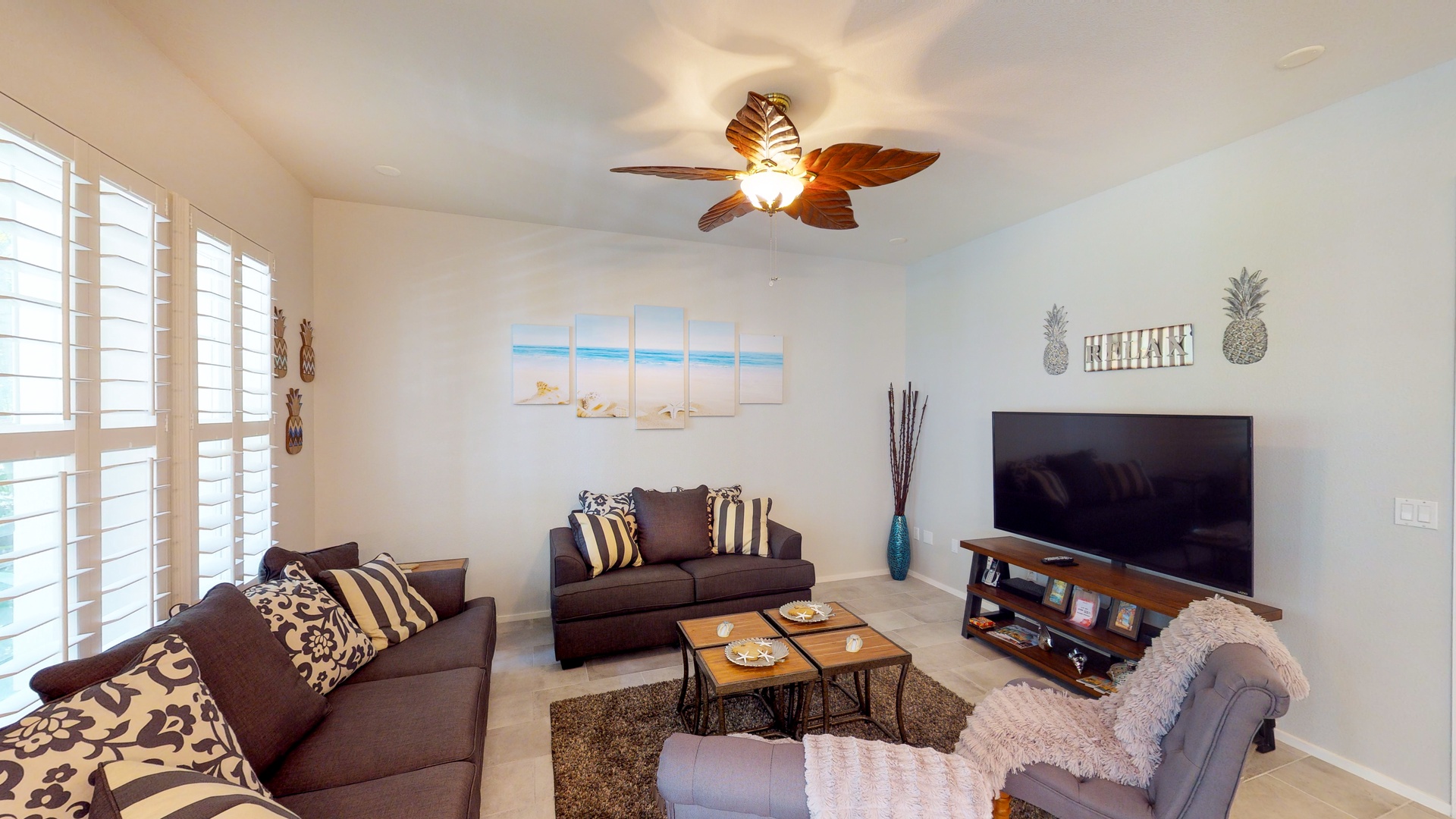 Kapolei Vacation Rentals, Coconut Plantation 1222-3 - Sink in to the plush seating with your favorite book or TV show in the living room.