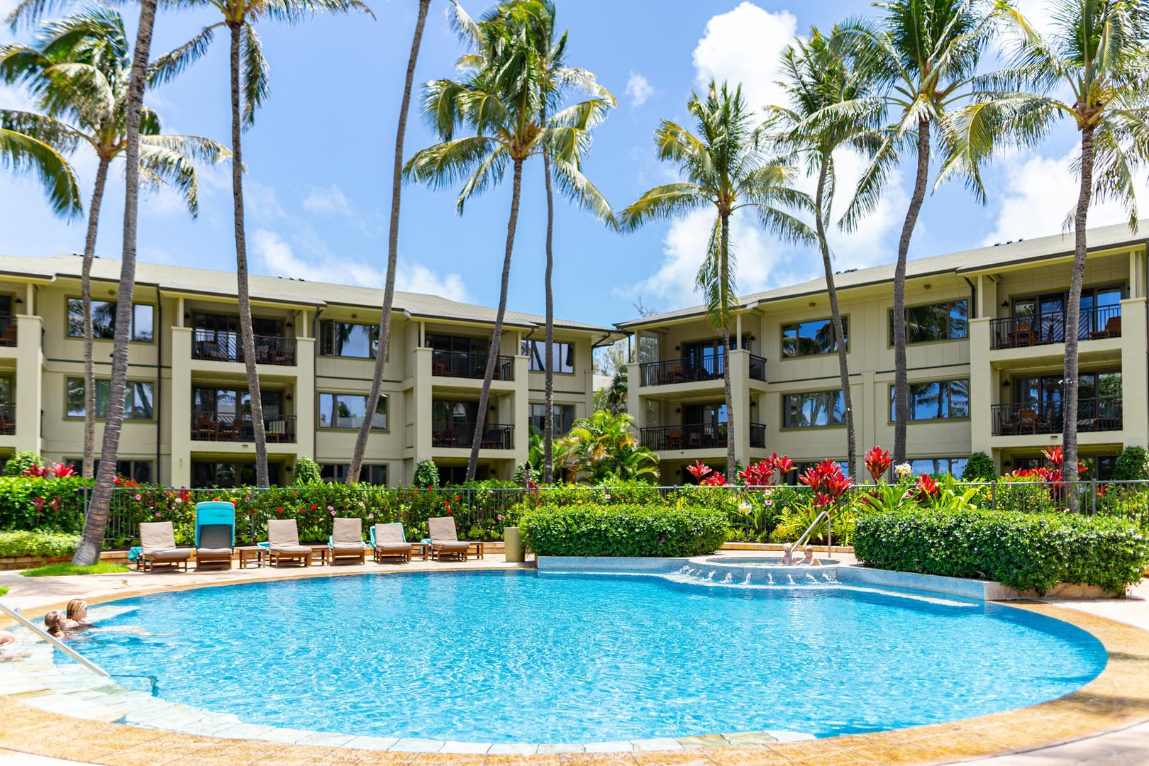 Kahuku Vacation Rentals, Turtle Bay Villas 114 - Lounge poolside and soak in the sun or jump in for some fun
