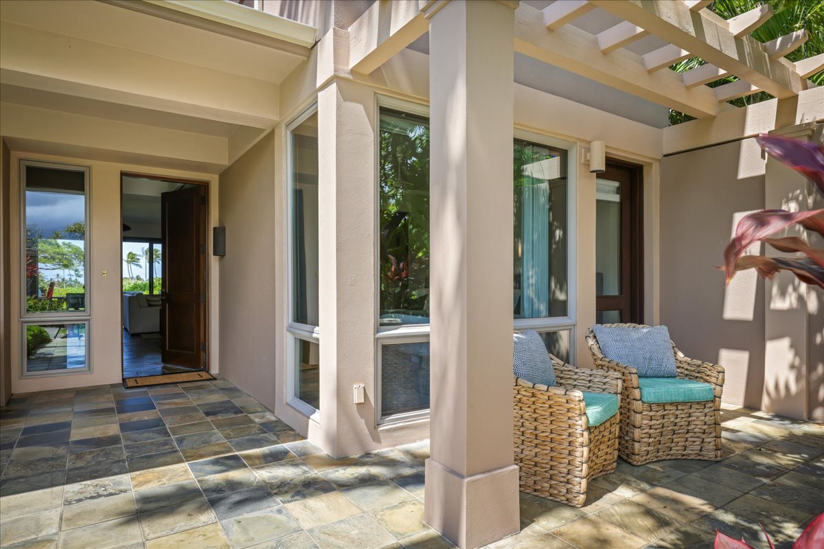Kailua Kona Vacation Rentals, 2BD Fairways Villa (120C) at Four Seasons Resort at Hualalai - Patio seating outside the guest bedroom.