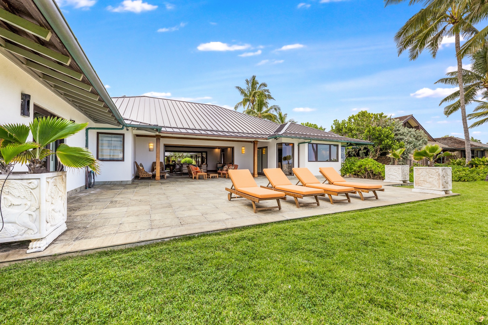 Kailua Vacation Rentals, Castle Point Estate - Lounge chairs line the terrace—stay close to the sea and soak in the ocean breeze.