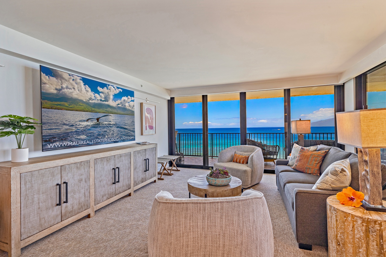 Lahaina Vacation Rentals, Kaanapali Shores 702 - Enjoy stunning ocean views from this bright and cozy living room, perfect for unwinding after a day of exploring.