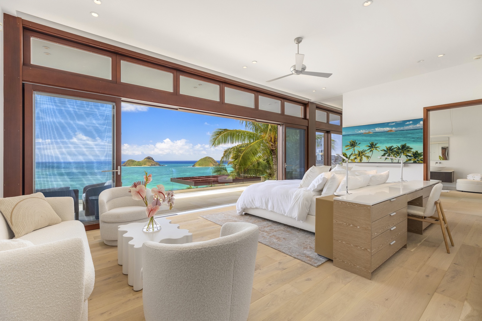 Kailua Vacation Rentals, Lanikai Hillside Estate - Primary bedroom with a king-sized bed and expansive ocean views, offering ultimate comfort and luxury.