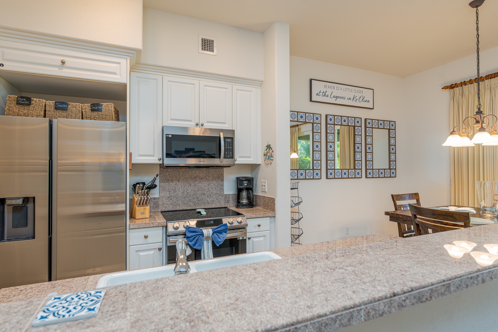 Kapolei Vacation Rentals, Coconut Plantation 1208-2 - The kitchen is equipped with stainless steel appliances for your culinary adventures.