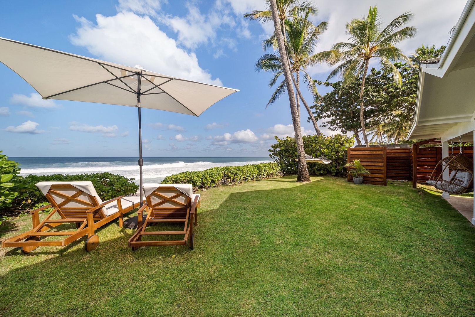 Haleiwa Vacation Rentals, Hale Nalu - Your private backyard gently leads you to the beach, just a few steps away!