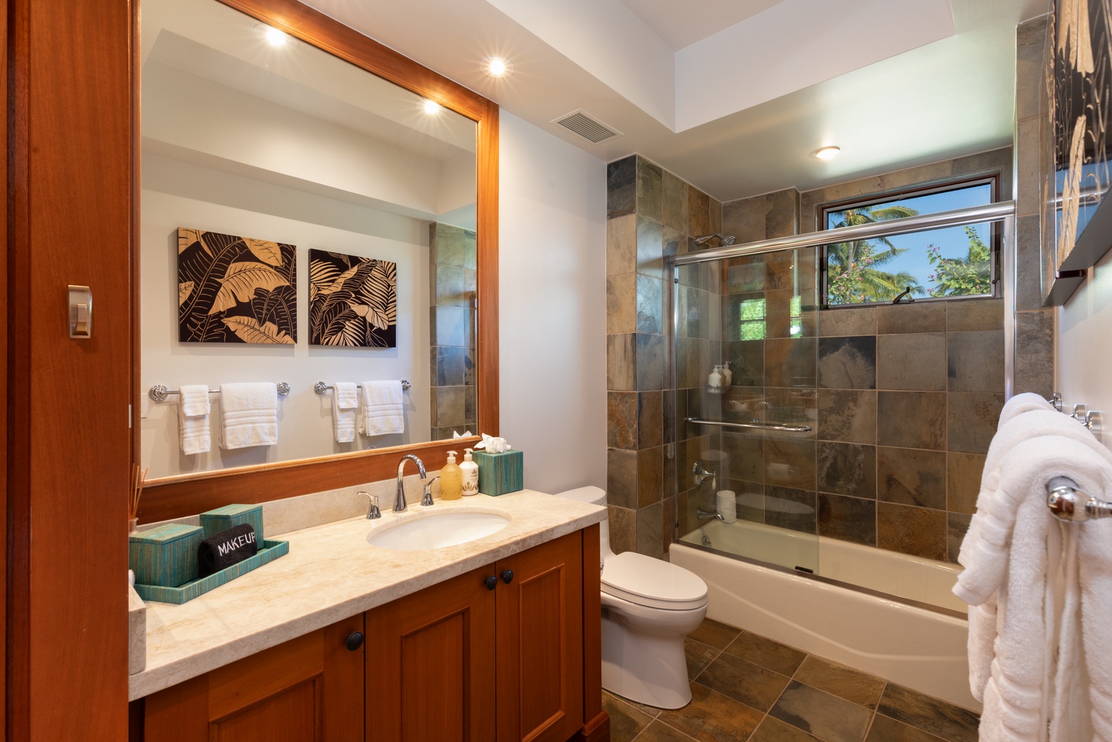 Kailua Kona Vacation Rentals, 3BD Waiulu Villa (111D) at Hualalai Resort - Unwind in your spa-like bathroom with natural stone details, tropical views, and luxurious amenities waiting for your perfect getaway.