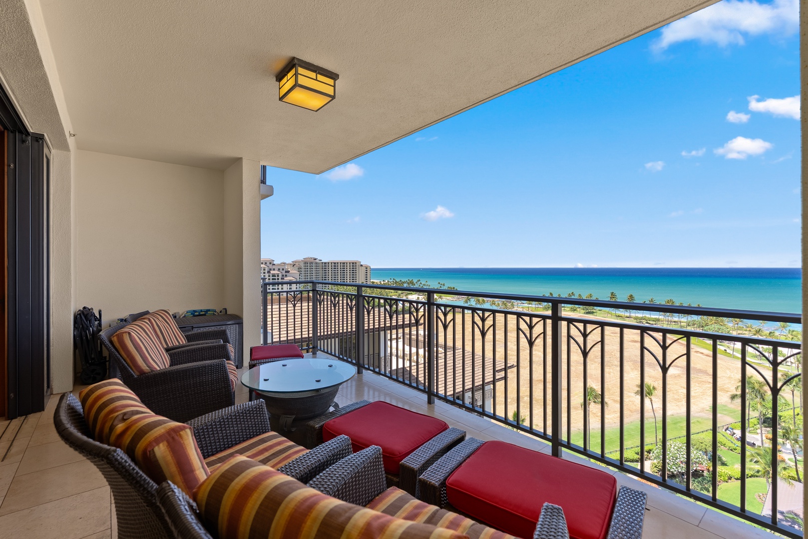 Kapolei Vacation Rentals, Ko Olina Beach Villas O1404 - Take the corner seat for the long view down the coast and out to sea.